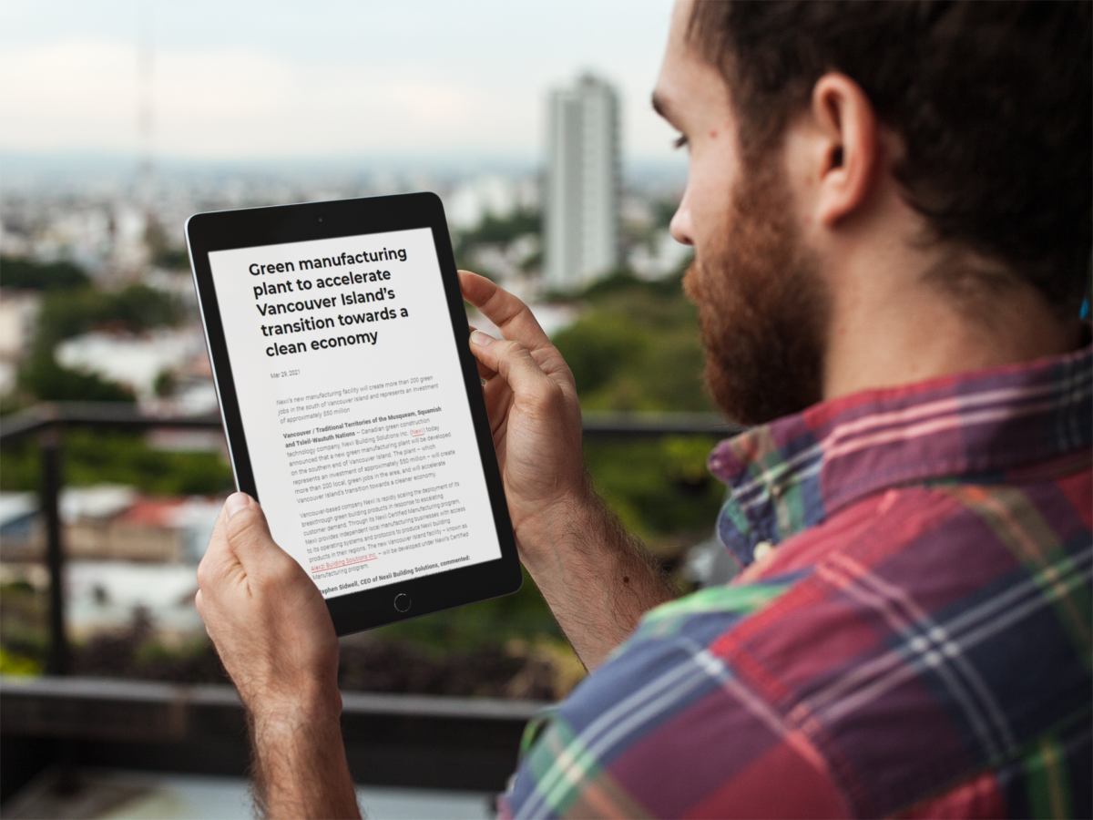 Man reading news on his tablet